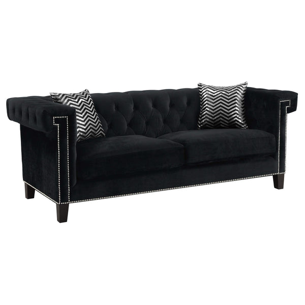 Sofá tapizado con brazos de riel Reventlow, color negro