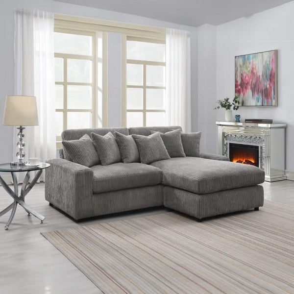 Sofá seccional reversible Tavia con 6 almohadas