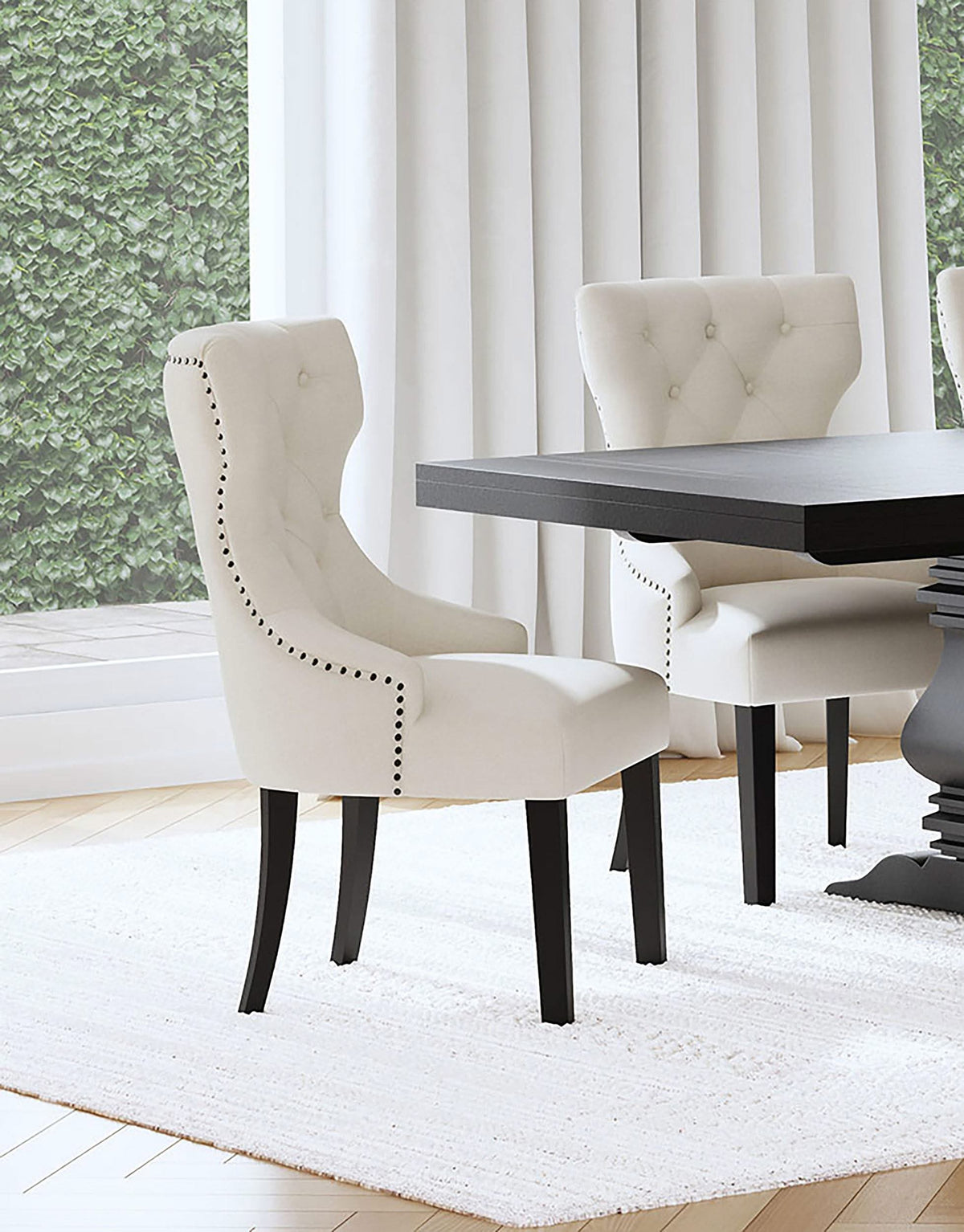 Silla de comedor Baney tapizada en tela beige y negra