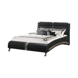 Cama estilo trineo Jeremaine tapizada en color negro