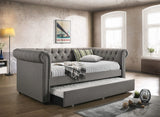 Cama de día individual tapizada Kepner con cama nido gris