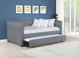 Sofá cama individual tapizado Brodie con cama nido gris