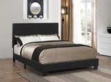 Cama matrimonial tapizada en color malva y color negro