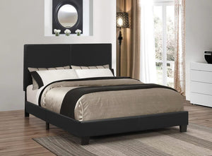 Cama matrimonial tapizada en color malva y color negro