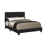 Cama matrimonial tapizada en color malva y color negro