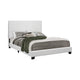 Cama individual con paneles tapizados en color malva y blanco