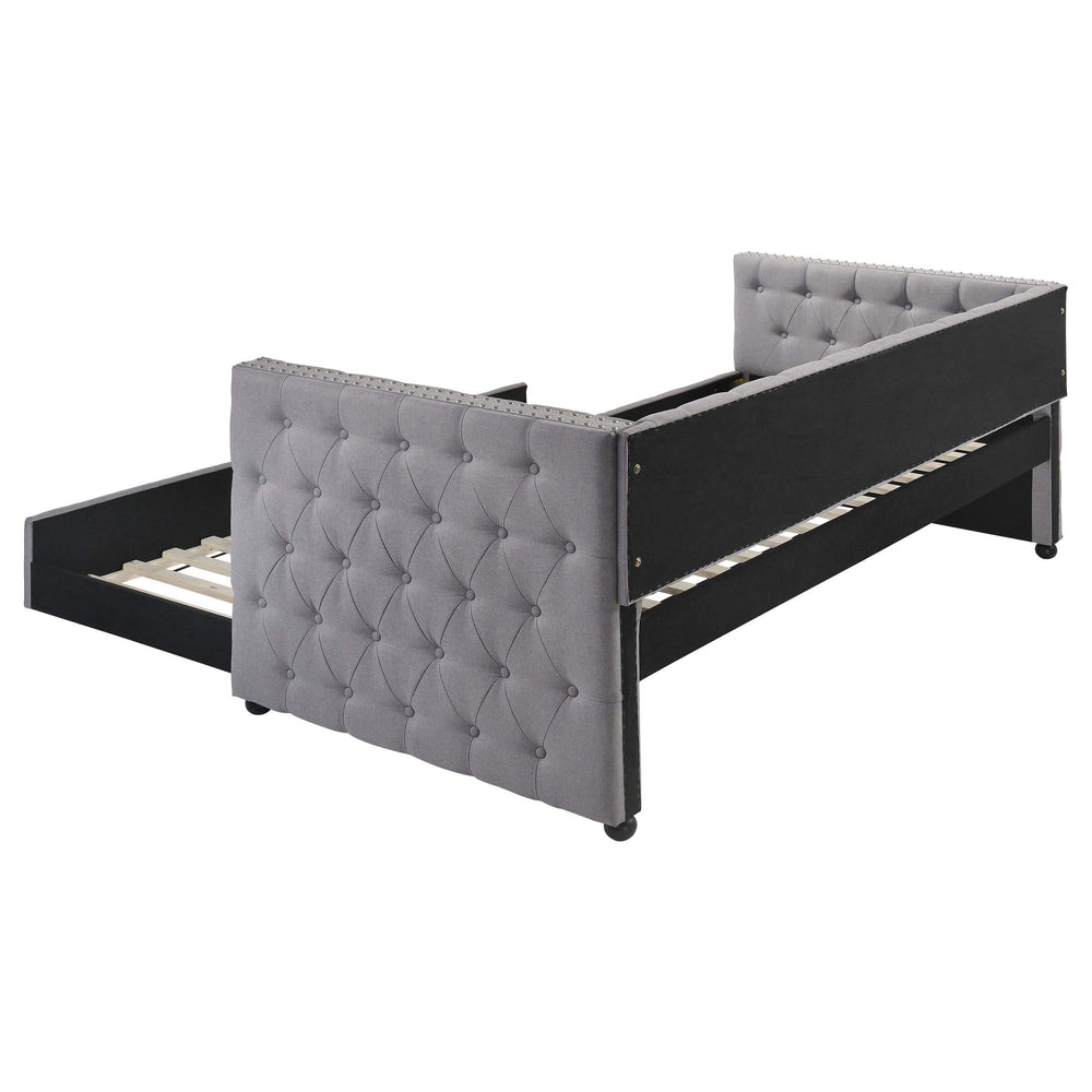 Sofá cama individual tapizado Mockern con cama nido gris