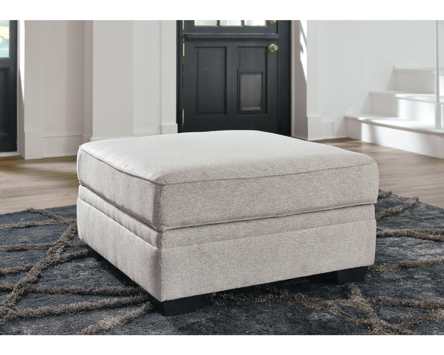 Dellara 4-Piece Sectional with Ottoman