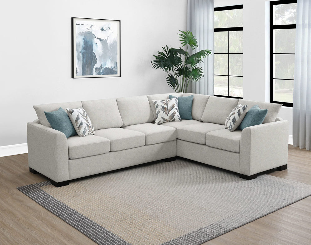 Sofá cama seccional tapizado en chenilla Ashford en color grisáceo