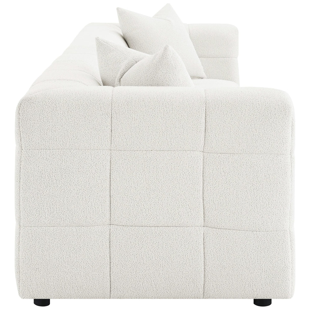 Sofá extra largo tapizado Everly Boucle en color blanco roto