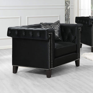 Sillón tapizado con brazos de riel Reventlow, color negro