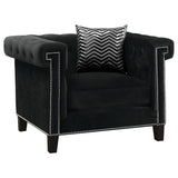 Sillón tapizado con brazos de riel Reventlow, color negro