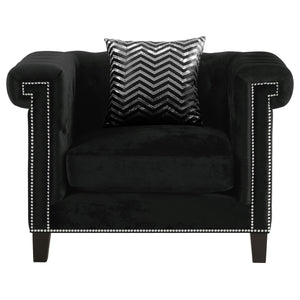 Sillón tapizado con brazos de riel Reventlow, color negro
