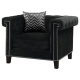 Sillón tapizado con brazos de riel Reventlow, color negro