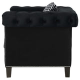 Sillón tapizado con brazos de riel Reventlow, color negro