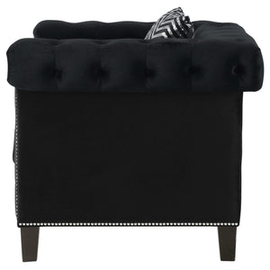 Sillón tapizado con brazos de riel Reventlow, color negro