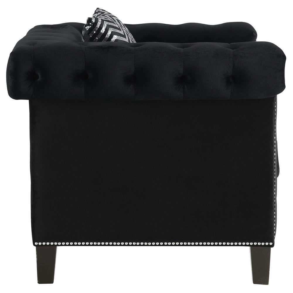 Sillón tapizado con brazos de riel Reventlow, color negro