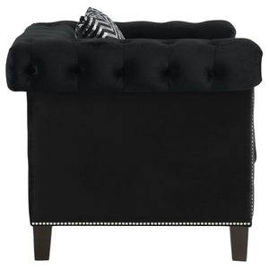 Sillón tapizado con brazos de riel Reventlow, color negro