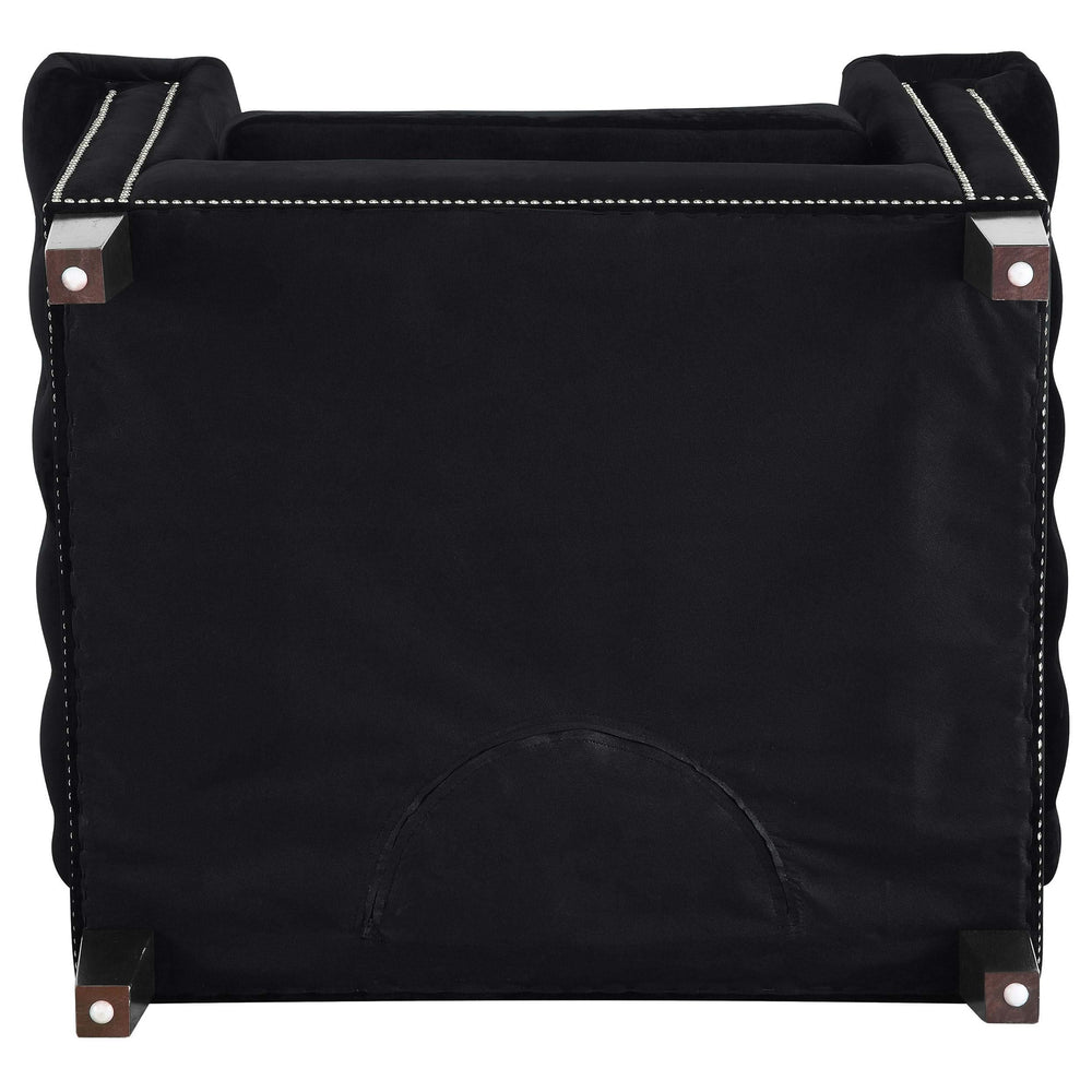 Sillón tapizado con brazos de riel Reventlow, color negro