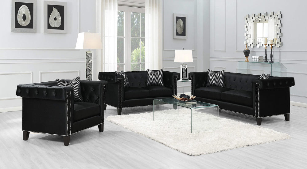 Sillón tapizado con brazos de riel Reventlow, color negro