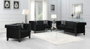 Sillón tapizado con brazos de riel Reventlow, color negro
