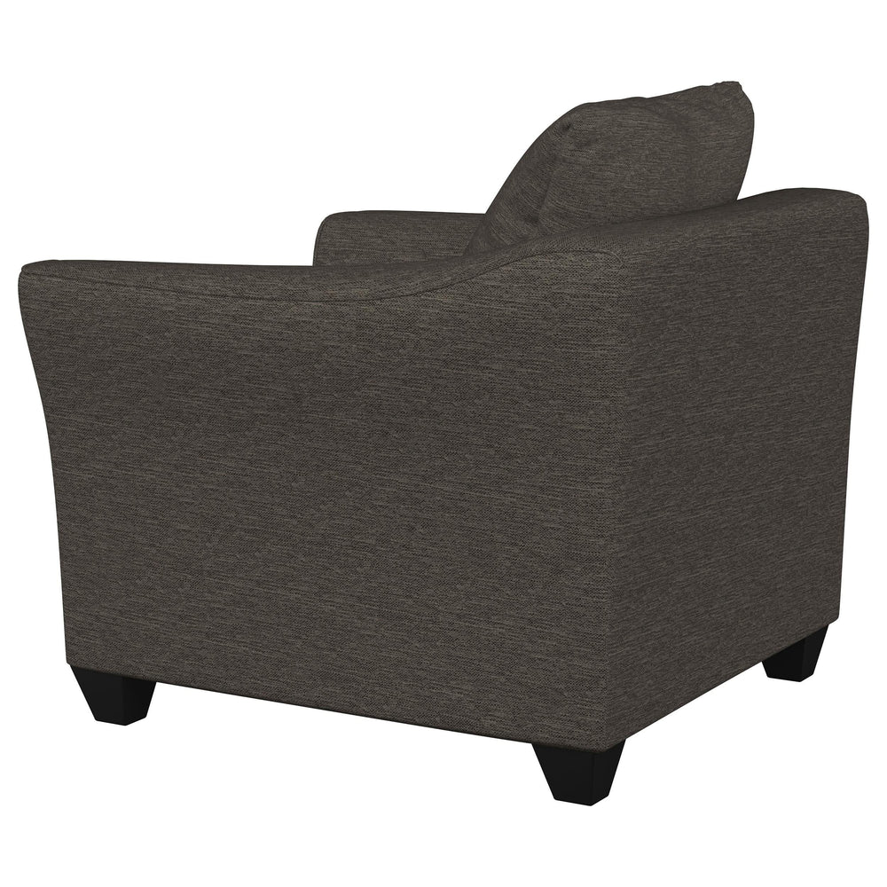 Sillón Salizar tapizado con brazos acampanados, color gris carbón