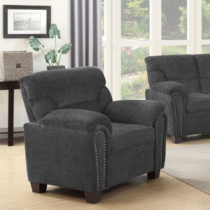 Sillón tapizado Clementine con brazos acolchados, color gris