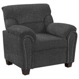 Sillón tapizado Clementine con brazos acolchados, color gris