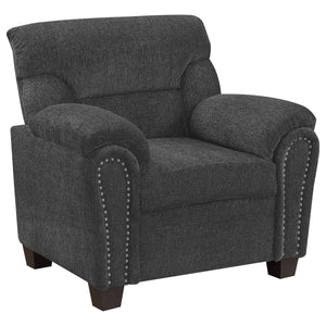 Sillón tapizado Clementine con brazos acolchados, color gris