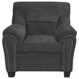 Sillón tapizado Clementine con brazos acolchados, color gris