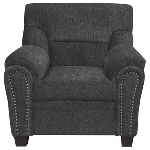 Sillón tapizado Clementine con brazos acolchados, color gris