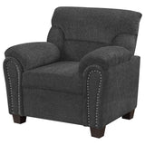 Sillón tapizado Clementine con brazos acolchados, color gris