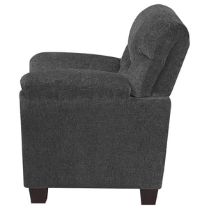 Sillón tapizado Clementine con brazos acolchados, color gris