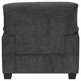 Sillón tapizado Clementine con brazos acolchados, color gris