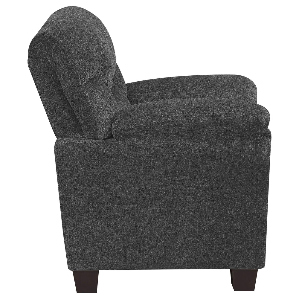 Sillón tapizado Clementine con brazos acolchados, color gris
