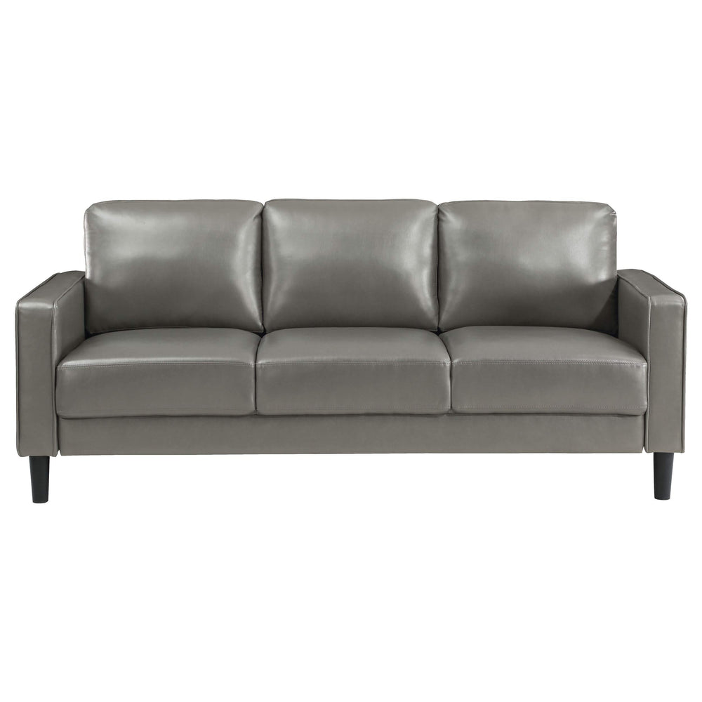 Sofá tapizado Ruth con brazos en gris