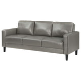 Sofá tapizado Ruth con brazos en gris