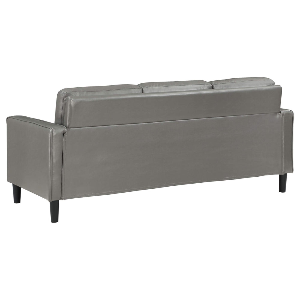 Sofá tapizado Ruth con brazos en gris