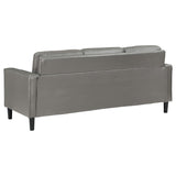 Sofá tapizado Ruth con brazos en gris