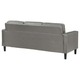 Sofá tapizado Ruth con brazos en gris