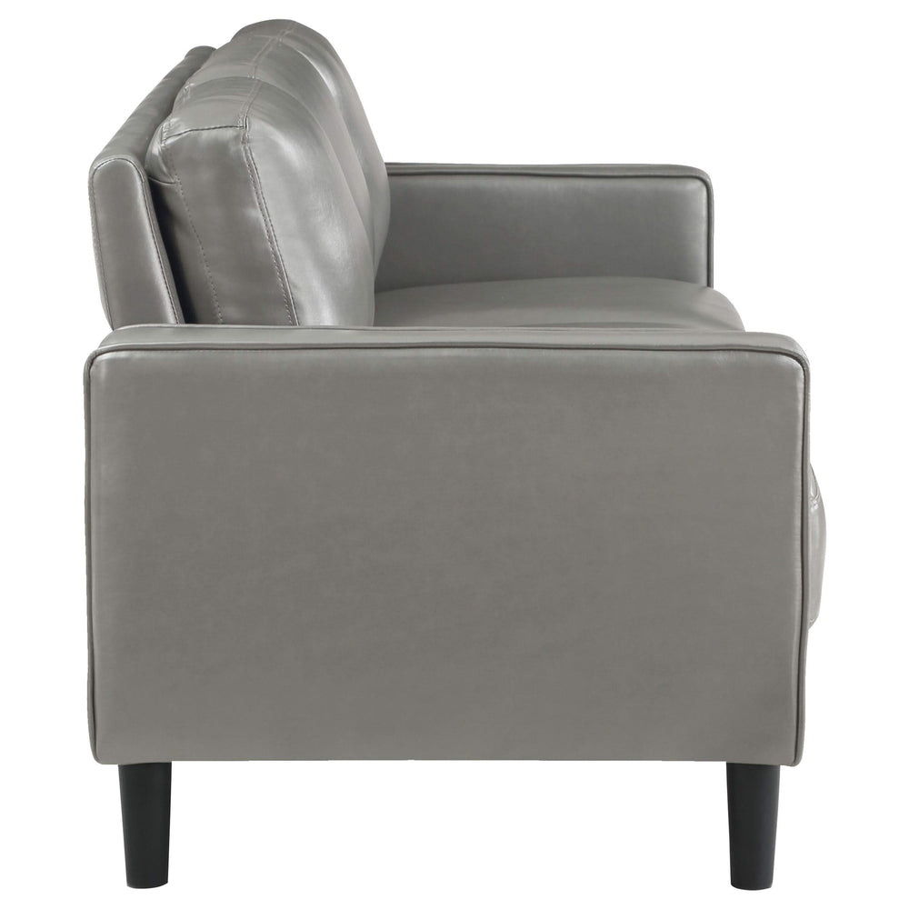 Sofá tapizado Ruth con brazos en gris