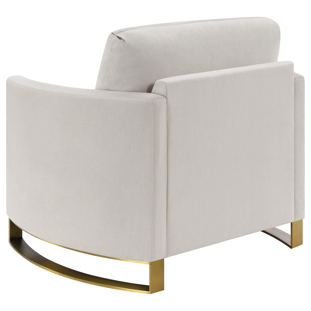 Sillón Corliss tapizado con brazos curvos en beige