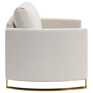 Sillón Corliss tapizado con brazos curvos en beige