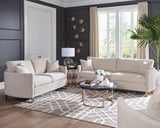 Sillón Corliss tapizado con brazos curvos en beige