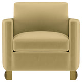Sillón Corliss tapizado con brazos curvos en color camello