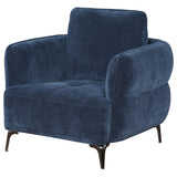 Sillón moderno tapizado en chenilla con brazos en azul