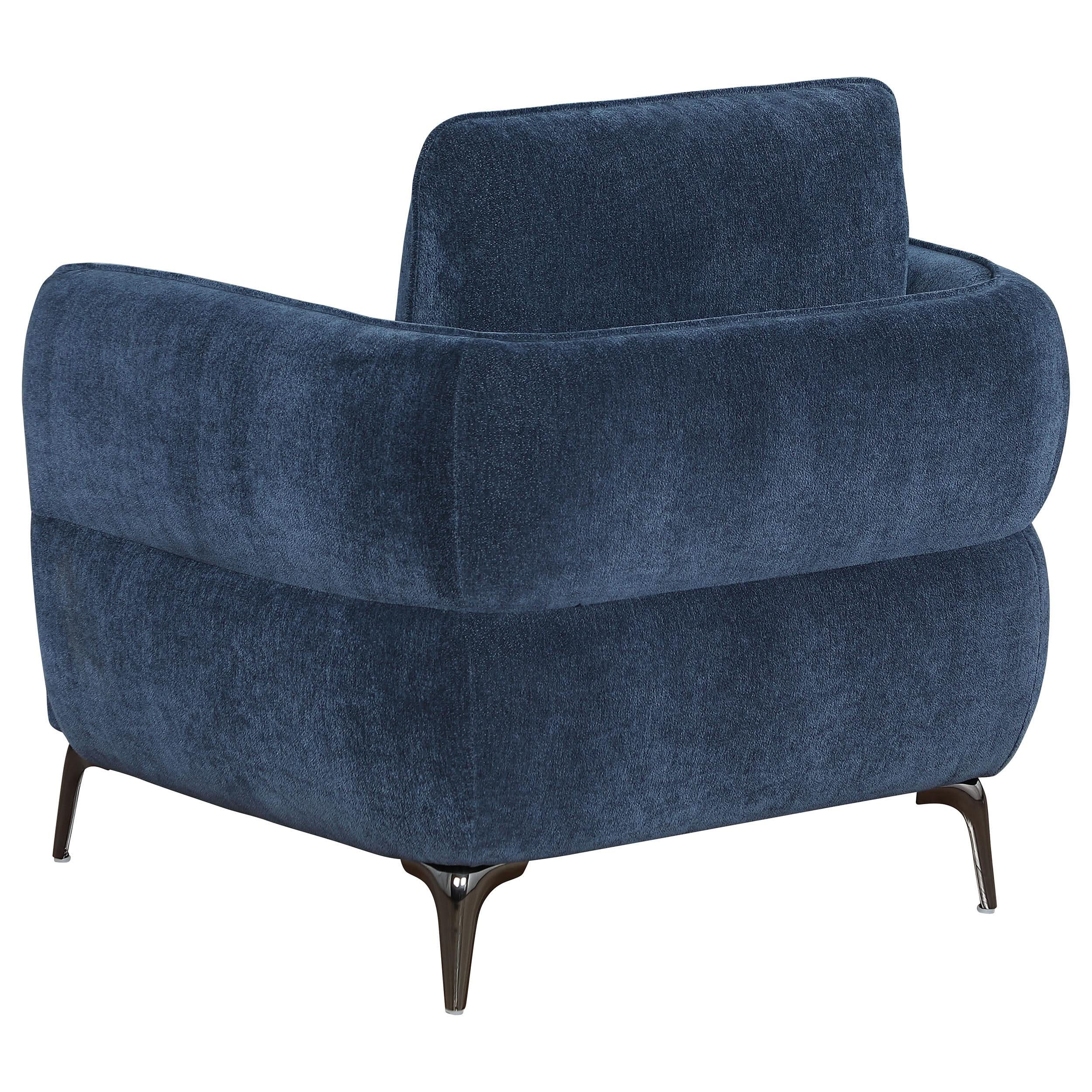 Sillón moderno tapizado en chenilla con brazos en azul