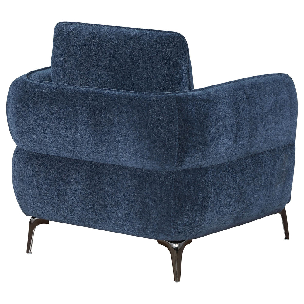 Sillón moderno tapizado en chenilla con brazos en azul