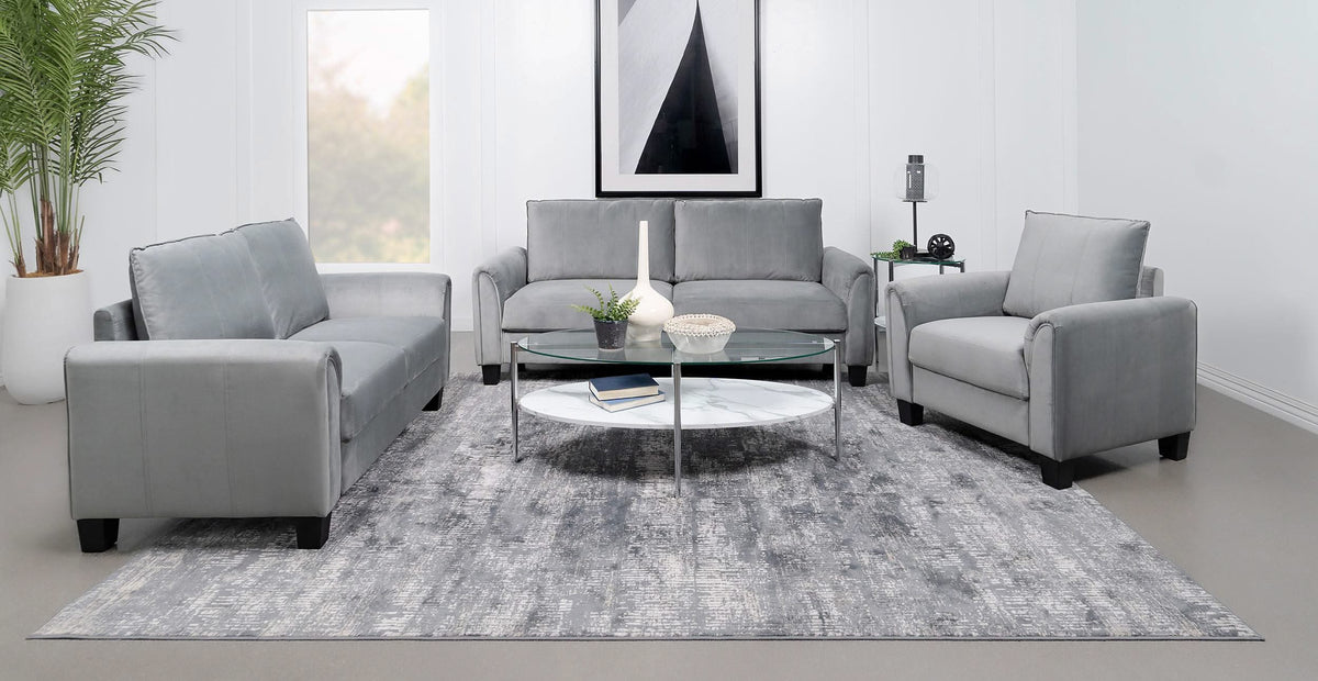 Sillón tapizado Davis con brazos enrollados, color gris