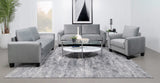 Sillón tapizado Davis con brazos enrollados, color gris
